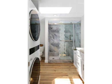 Welcome to this beautifully transformed and private end-unit on Laguna Woods Village Golf Course in California - for sale on GolfHomes.com, golf home, golf lot