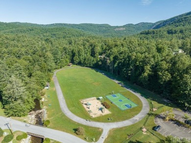 Nestled within the confines of the Bald Rock community, this on Sapphire National Golf Club in North Carolina - for sale on GolfHomes.com, golf home, golf lot