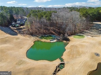 Prime golf course lot nestled within the prestigious Hawks Ridge on Hawks Ridge Golf Club in Georgia - for sale on GolfHomes.com, golf home, golf lot