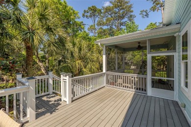 This marsh-front custom-built home in Hampton Plantation has an on The King and Prince Golf Course, Home of the Hampton Club in Georgia - for sale on GolfHomes.com, golf home, golf lot