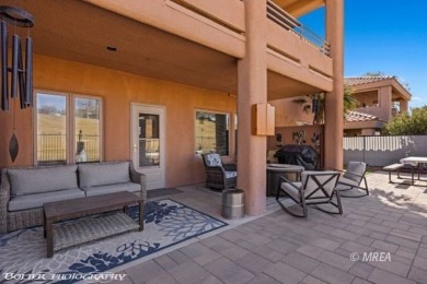 This stunning two-story single-family residence has been on The Oasis Golf Club in Nevada - for sale on GolfHomes.com, golf home, golf lot