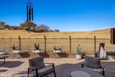 This stunning two-story single-family residence has been on The Oasis Golf Club in Nevada - for sale on GolfHomes.com, golf home, golf lot