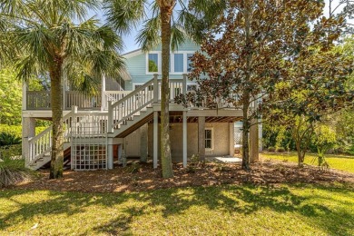 This marsh-front custom-built home in Hampton Plantation has an on The King and Prince Golf Course, Home of the Hampton Club in Georgia - for sale on GolfHomes.com, golf home, golf lot