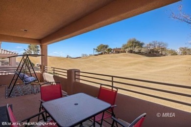 This stunning two-story single-family residence has been on The Oasis Golf Club in Nevada - for sale on GolfHomes.com, golf home, golf lot