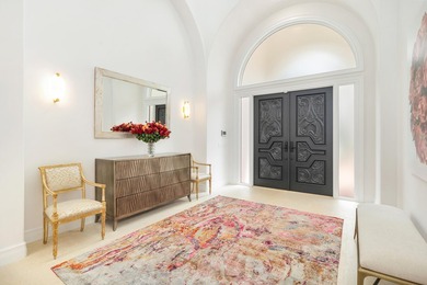 An extraordinary one level offering within the prestigious Palm on  in Florida - for sale on GolfHomes.com, golf home, golf lot