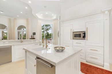 An extraordinary one level offering within the prestigious Palm on  in Florida - for sale on GolfHomes.com, golf home, golf lot