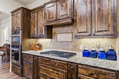 Gorgeous 2,522sqft home on .5 park-like acres in the prestigious on Sugar Tree Golf and Country Club in Texas - for sale on GolfHomes.com, golf home, golf lot