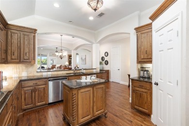 This home is perfectly situated with scenic views of the 3rd on Heritage Ranch Golf and Country Club in Texas - for sale on GolfHomes.com, golf home, golf lot