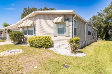 Discover a residence nestled within Winter Haven's prestigious on Four Lakes Golf Club in Florida - for sale on GolfHomes.com, golf home, golf lot