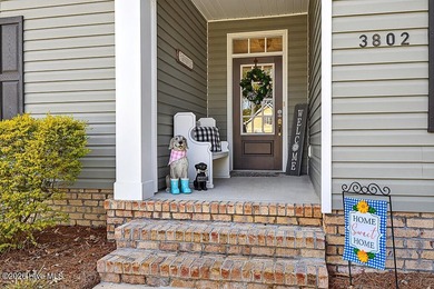 Beautifully maintained home in the Carolina Colours community on Carolina Colours Golf Club in North Carolina - for sale on GolfHomes.com, golf home, golf lot