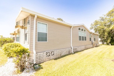 Discover a residence nestled within Winter Haven's prestigious on Four Lakes Golf Club in Florida - for sale on GolfHomes.com, golf home, golf lot