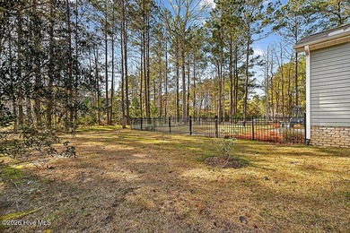 Beautifully maintained home in the Carolina Colours community on Carolina Colours Golf Club in North Carolina - for sale on GolfHomes.com, golf home, golf lot