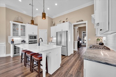 Live the lake-and-golf lifestyle at Grand Harbor, where custom on The Patriot Golf Club At Grand Harbor in South Carolina - for sale on GolfHomes.com, golf home, golf lot