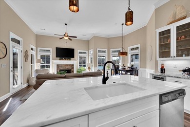 Live the lake-and-golf lifestyle at Grand Harbor, where custom on The Patriot Golf Club At Grand Harbor in South Carolina - for sale on GolfHomes.com, golf home, golf lot