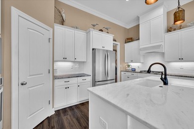 Live the lake-and-golf lifestyle at Grand Harbor, where custom on The Patriot Golf Club At Grand Harbor in South Carolina - for sale on GolfHomes.com, golf home, golf lot