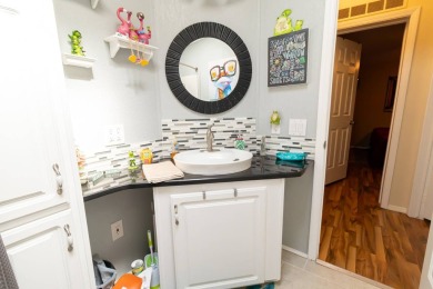 Discover a residence nestled within Winter Haven's prestigious on Four Lakes Golf Club in Florida - for sale on GolfHomes.com, golf home, golf lot