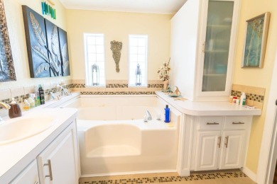 Discover a residence nestled within Winter Haven's prestigious on Four Lakes Golf Club in Florida - for sale on GolfHomes.com, golf home, golf lot