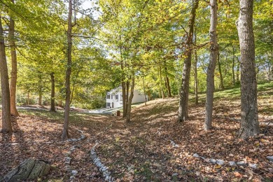 Welcome to 20955 Ferngrove Ct, a beautifully updated two-story on Hidden Valley Golf Club in Indiana - for sale on GolfHomes.com, golf home, golf lot