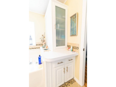 Discover a residence nestled within Winter Haven's prestigious on Four Lakes Golf Club in Florida - for sale on GolfHomes.com, golf home, golf lot