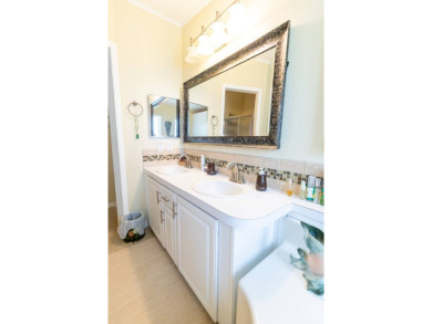 Discover a residence nestled within Winter Haven's prestigious on Four Lakes Golf Club in Florida - for sale on GolfHomes.com, golf home, golf lot