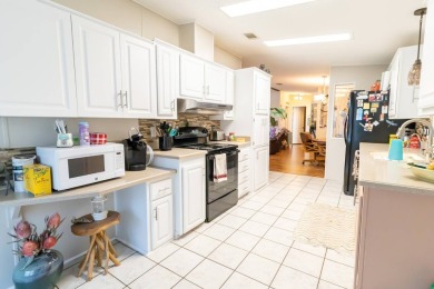 Discover a residence nestled within Winter Haven's prestigious on Four Lakes Golf Club in Florida - for sale on GolfHomes.com, golf home, golf lot