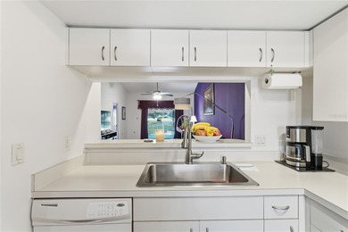 Welcome to this beautifully updated two-bedroom, two-bathroom on Countryside Country Club in Florida - for sale on GolfHomes.com, golf home, golf lot