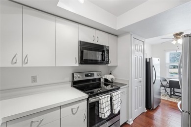 Welcome to this beautifully updated two-bedroom, two-bathroom on Countryside Country Club in Florida - for sale on GolfHomes.com, golf home, golf lot