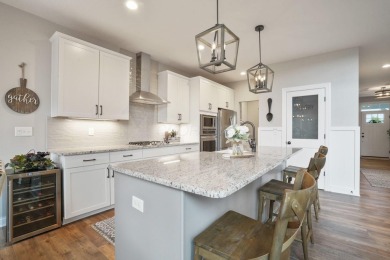 Step into a realm of sophisticated comfort with this exceptional on Golf Club of Dublin in Ohio - for sale on GolfHomes.com, golf home, golf lot