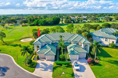 Step into luxury living in this gated community, end unit , golf on Santa Lucia River Club in Florida - for sale on GolfHomes.com, golf home, golf lot