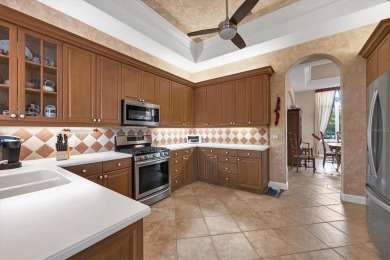 A Meticulously Maintained Custom Home in Rosedale Golf Community on Rosedale Golf and Tennis Club in Florida - for sale on GolfHomes.com, golf home, golf lot