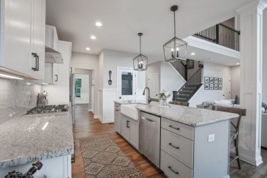 Step into a realm of sophisticated comfort with this exceptional on Golf Club of Dublin in Ohio - for sale on GolfHomes.com, golf home, golf lot