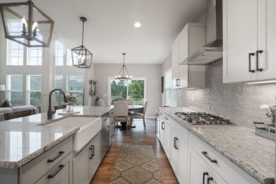 Step into a realm of sophisticated comfort with this exceptional on Golf Club of Dublin in Ohio - for sale on GolfHomes.com, golf home, golf lot