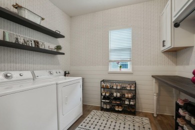 Step into a realm of sophisticated comfort with this exceptional on Golf Club of Dublin in Ohio - for sale on GolfHomes.com, golf home, golf lot
