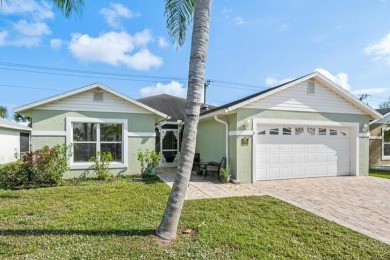 Morning coffee or evening cocktails on the enclosed lanai on Spanish Lakes Fairways in Florida - for sale on GolfHomes.com, golf home, golf lot