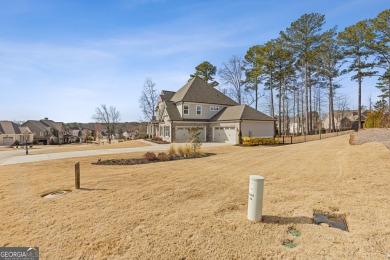 Welcome to this LIKE NEW custom home perfectly appointed on a on Traditions of Braselton Golf Club in Georgia - for sale on GolfHomes.com, golf home, golf lot