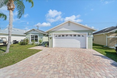 Morning coffee or evening cocktails on the enclosed lanai on Spanish Lakes Fairways in Florida - for sale on GolfHomes.com, golf home, golf lot