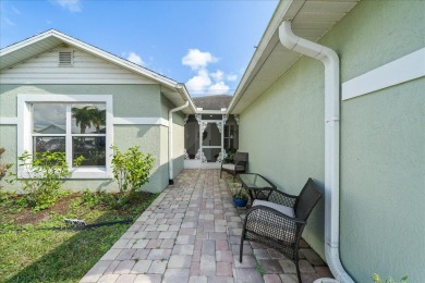 Morning coffee or evening cocktails on the enclosed lanai on Spanish Lakes Fairways in Florida - for sale on GolfHomes.com, golf home, golf lot