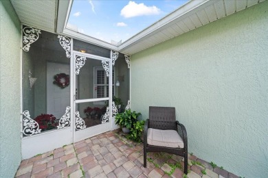Morning coffee or evening cocktails on the enclosed lanai on Spanish Lakes Fairways in Florida - for sale on GolfHomes.com, golf home, golf lot