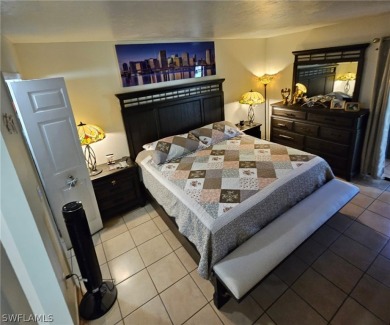 Embrace resort-style living in this vibrant 2-bedroom, 2-bath on Lehigh Resort Club in Florida - for sale on GolfHomes.com, golf home, golf lot