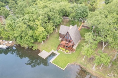 Welcome to your dream Lodge-like home nestled on a sprawling on Raintree Country Club in Missouri - for sale on GolfHomes.com, golf home, golf lot