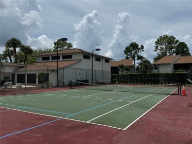 Enjoy all the benefits of Florida living, without the hassle of on Feather Sound Country Club in Florida - for sale on GolfHomes.com, golf home, golf lot