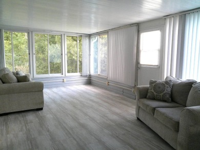 If you're searching for a beautiful, move-in ready home with on Hamptons Golf Club in Florida - for sale on GolfHomes.com, golf home, golf lot