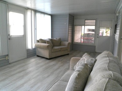 If you're searching for a beautiful, move-in ready home with on Hamptons Golf Club in Florida - for sale on GolfHomes.com, golf home, golf lot