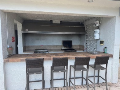 Enjoy all the benefits of Florida living, without the hassle of on Feather Sound Country Club in Florida - for sale on GolfHomes.com, golf home, golf lot