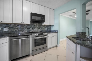 Enjoy all the benefits of Florida living, without the hassle of on Feather Sound Country Club in Florida - for sale on GolfHomes.com, golf home, golf lot