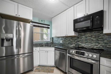 Enjoy all the benefits of Florida living, without the hassle of on Feather Sound Country Club in Florida - for sale on GolfHomes.com, golf home, golf lot