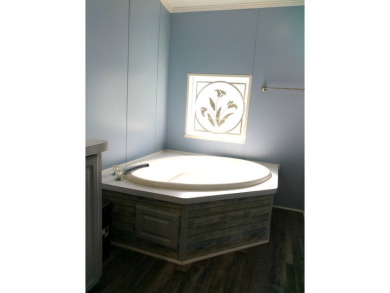 If you're searching for a beautiful, move-in ready home with on Hamptons Golf Club in Florida - for sale on GolfHomes.com, golf home, golf lot
