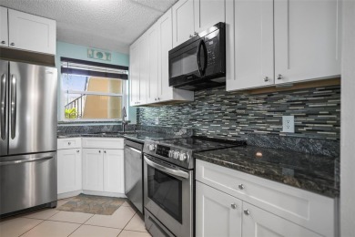 Enjoy all the benefits of Florida living, without the hassle of on Feather Sound Country Club in Florida - for sale on GolfHomes.com, golf home, golf lot