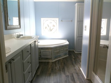 If you're searching for a beautiful, move-in ready home with on Hamptons Golf Club in Florida - for sale on GolfHomes.com, golf home, golf lot