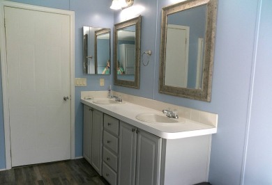 If you're searching for a beautiful, move-in ready home with on Hamptons Golf Club in Florida - for sale on GolfHomes.com, golf home, golf lot